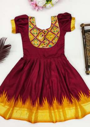 Binny Crepe Beautiful Stitched  Dola Silk With Viscose Border Design Kids Kurti Maroon And Yellow Color