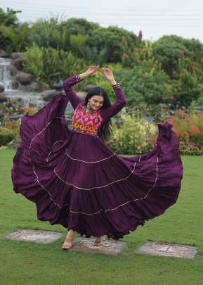 Demanding Navratri Garba Nights Reyon Kutchi Gamthi With Embroidered And Mirror hand Work Gown Purple Color 