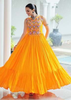 Exclusive Navratri Gown Reyon Kutchi With Gamthi And Embroidered With Mirror Work Yellow Color Gown DN 9258