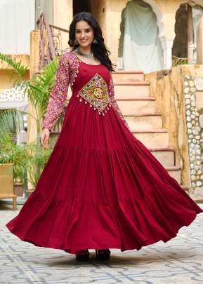 Navratri Special Reyon With Kutchi Gamthi Embroidered Work And Cotton Print Work Gown Maroon Color DN 9256